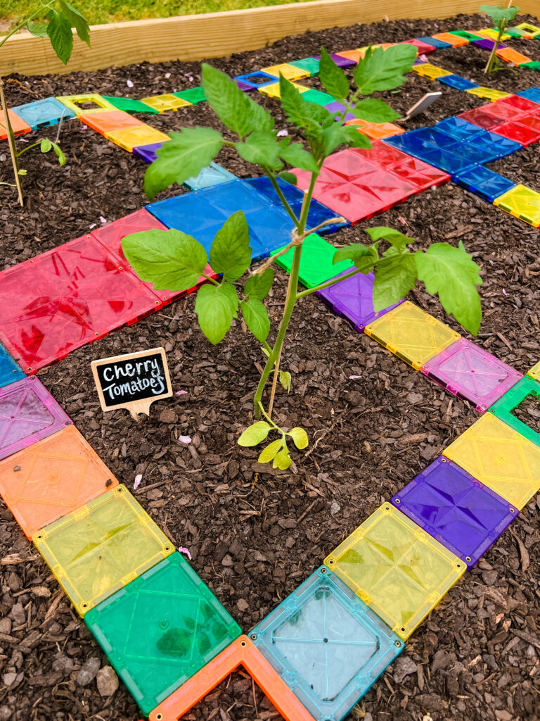 Parenting Hack Using Magna-Tiles In The Garden