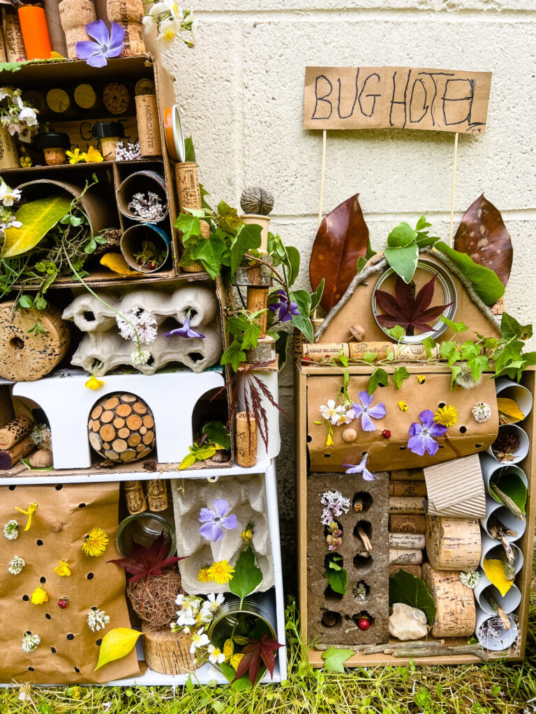 Garden Bug Hotel for kids made with recycled materials and items from nature.
