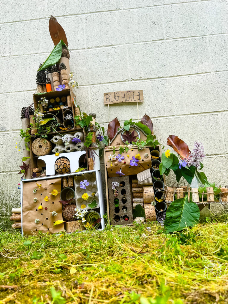 Ground view of Bug Hotel for kids made with recycled materials and items from nature.