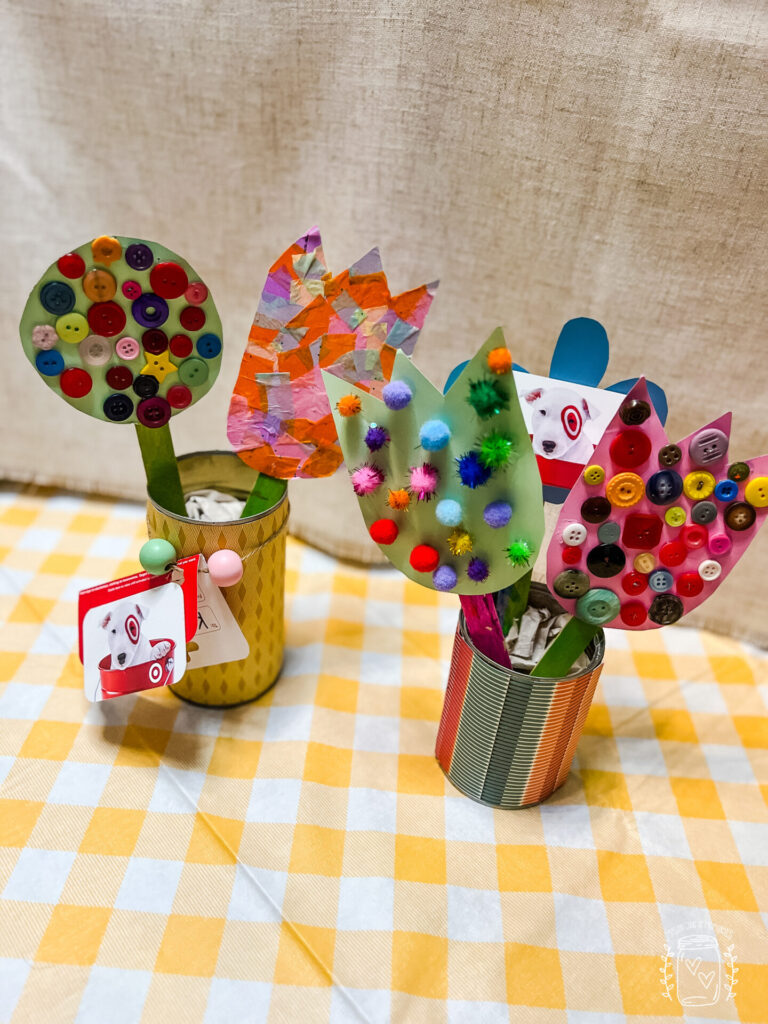 Spring flower craft made with various craft items with Target gift card attached.