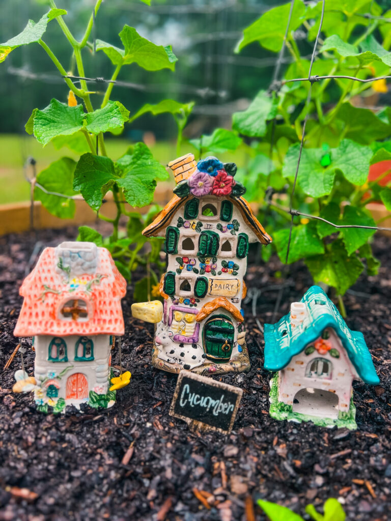 Ceramic houses to decorate the garden found at a garage sale.