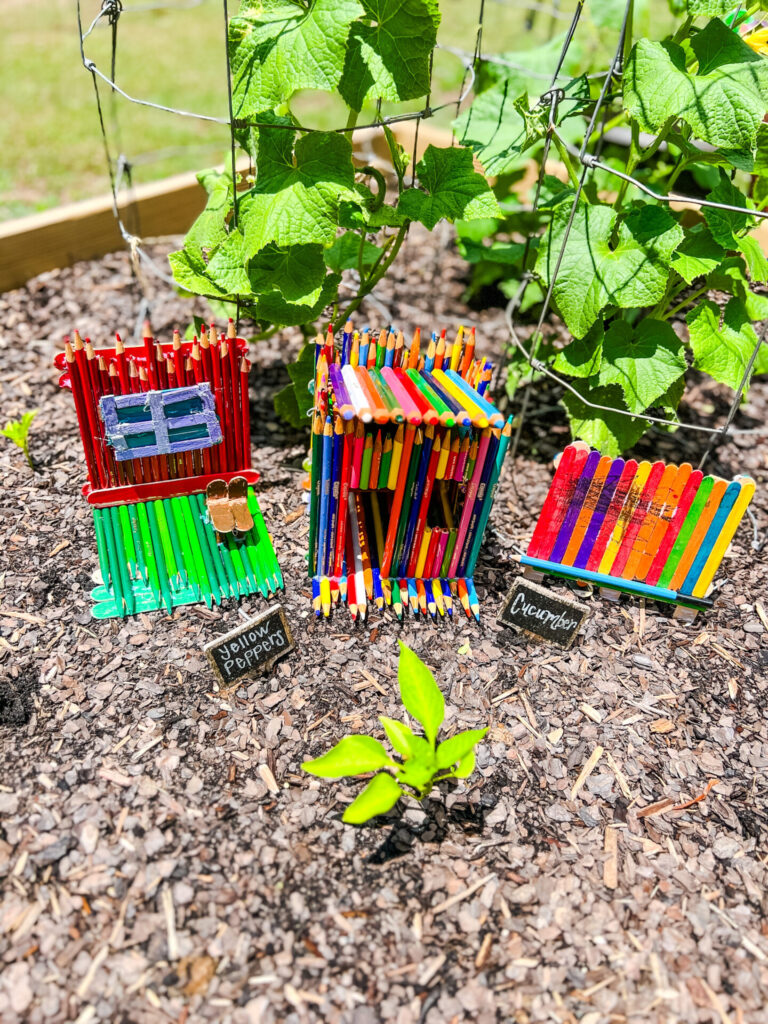 Garden Fairy Village made our of colored pencils or popsicle sticks.