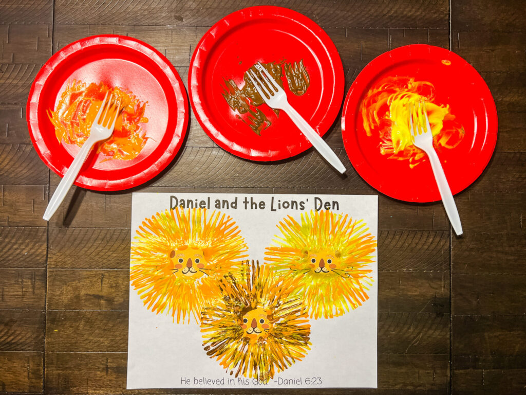 Daniel and the Lions Den painting craft with forks and paint.