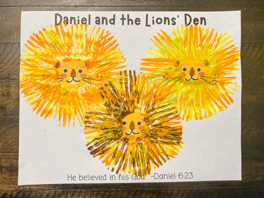 Daniel and the Lions Den painting craft using paint and plastic forks.