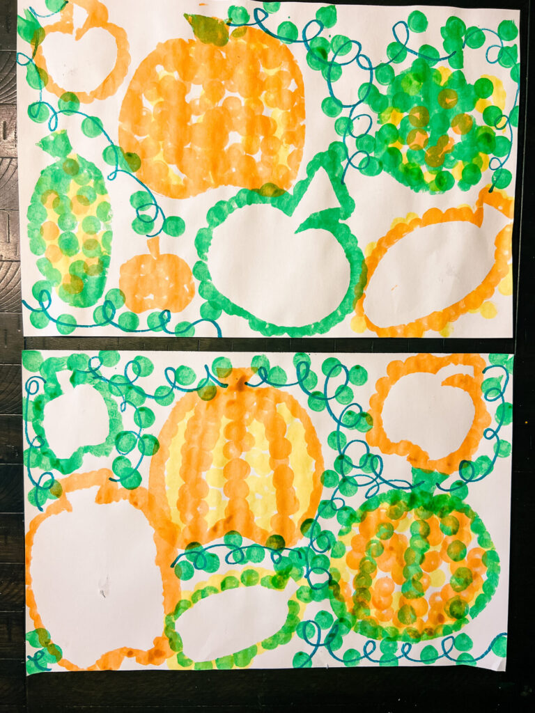 Pumpkin Dot Art, two large pieces of large construction paper with orange, yellow, and green pumpkins and green pumpkin vines all colored with do a dot art markers.